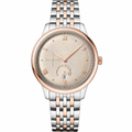 Two-tone dress watch with light dial and metal bracelet in silver and rose gold tones, 41mm case